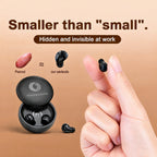 Midnight Black Sleepsono earbud held between finger and thumb next to a peanut for size