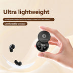 Hand holding the Midnight Black Sleepsono charging case with floating earbuds and a feather