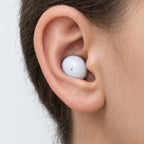 Close-up of a Sleepsono sleep earbud seated flush in the ear